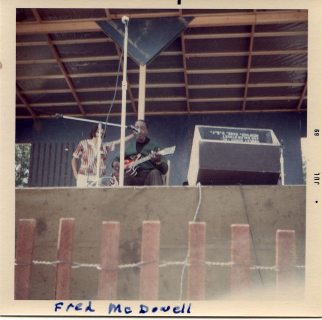 Fred McDowell with Dick Waterman looking on.